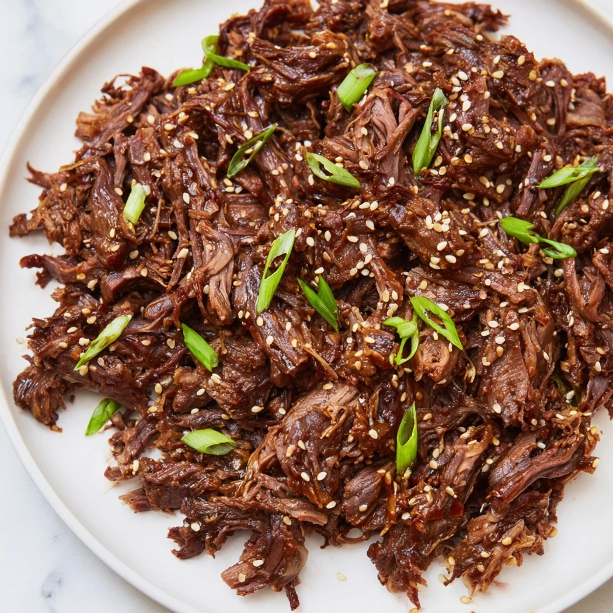 Tender Slow Cooker Korean Beef recipe ready to be served in crisp lettuce wraps for a delicious meal.