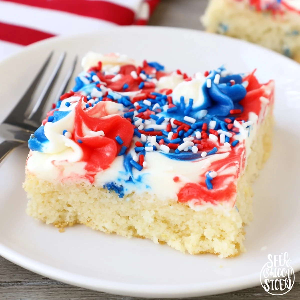 Patriotic Sugar Cookie Bars 4th Of July Dessert Recipe served on a picnic platter